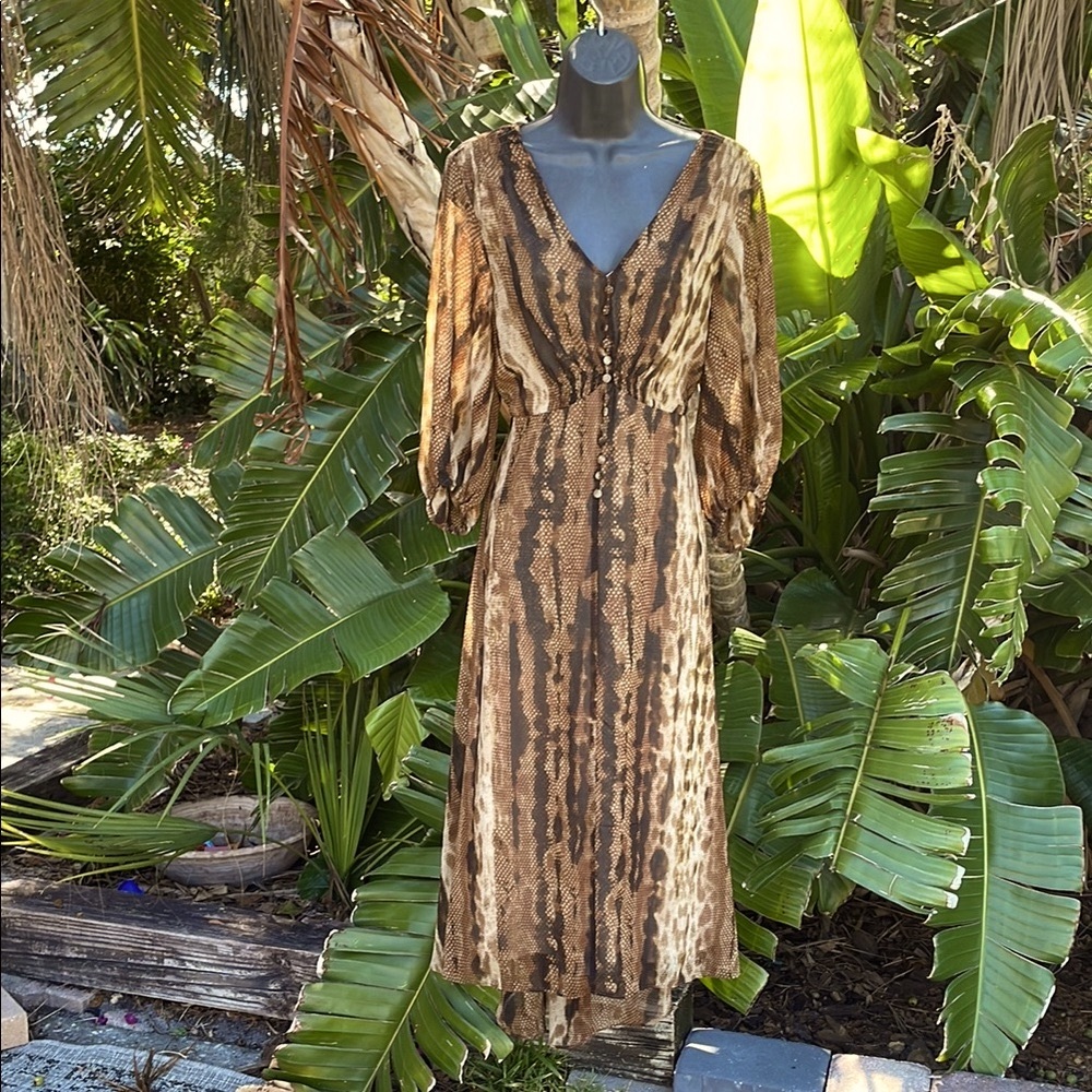 animal print dress with three-quarter sheer puff sleev…